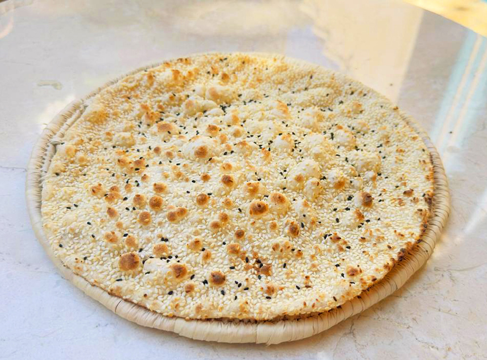 sesame-black-seeds-tannour-bread-5-loaves